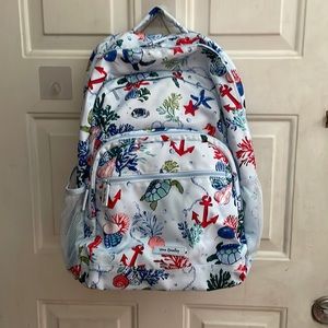 Lightly used Vera Bradley book bag, one of the zipper hooks is missing.
